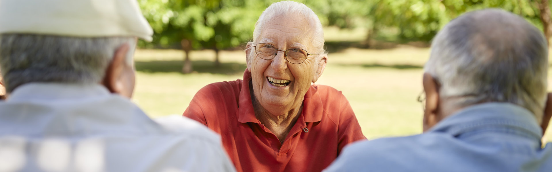 Group of three elderly men having fun.